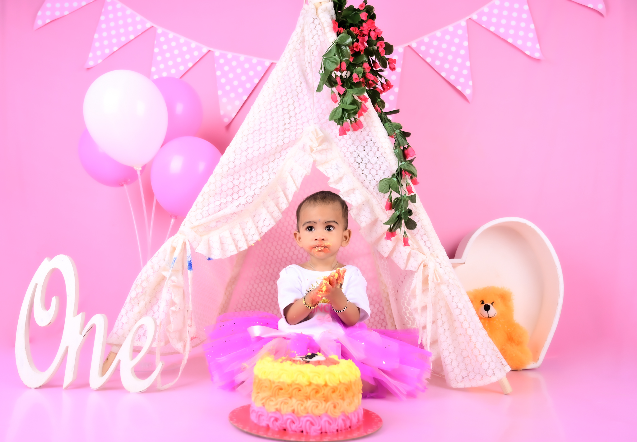 Pink cake smash birthday setup in Bangalore